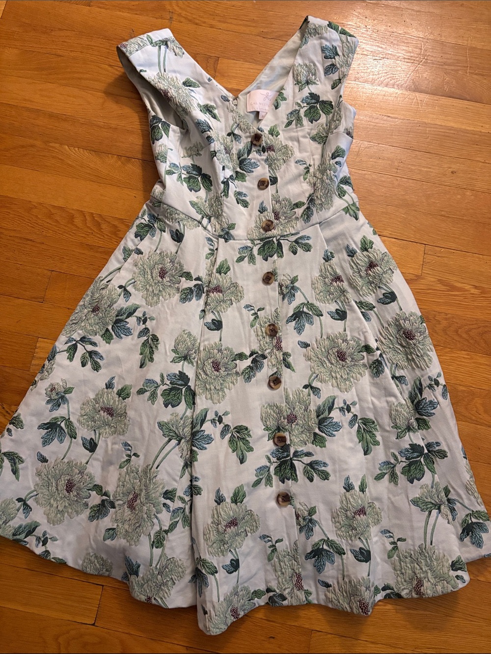 Gal Meets Glam White Floral Cotton Sundress with Green Leaf Print